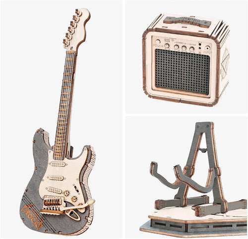 Wooden model of an electric guitar and amplifier on a white background