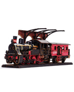 Model train set with a red car and black locomotive on a white background