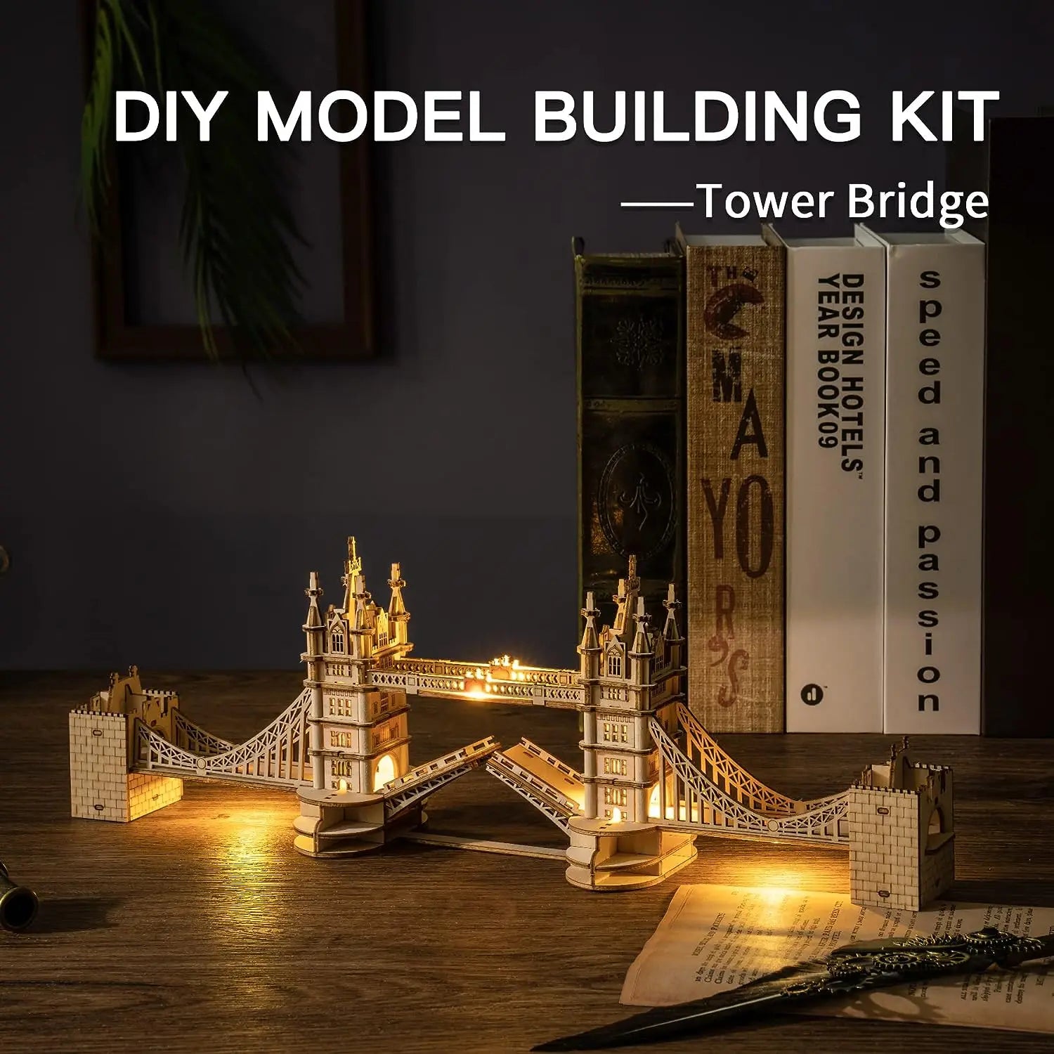 Model of Tower Bridge with packaging on a wooden surface